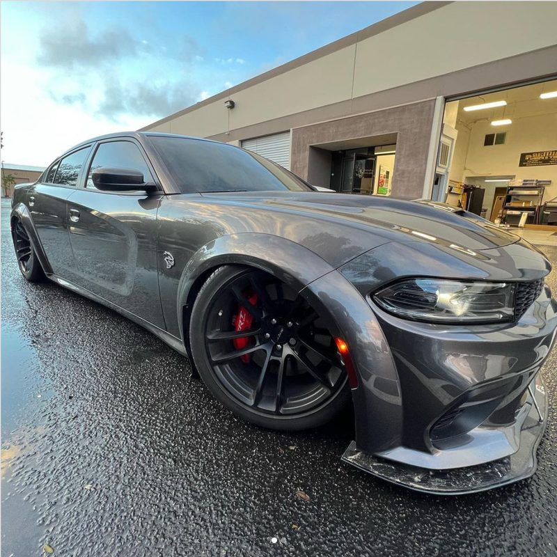 Gray Dodge Charger SRT widebody with tinted windows outside Premium Wraps & Tint in Santa Maria